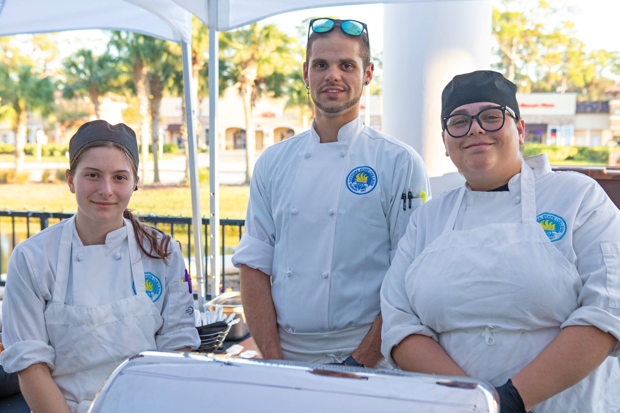 Culinary students grilling at an on-campus event.