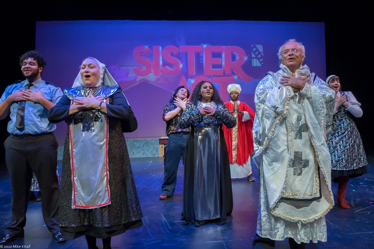 actors on stage performing Sister Act play