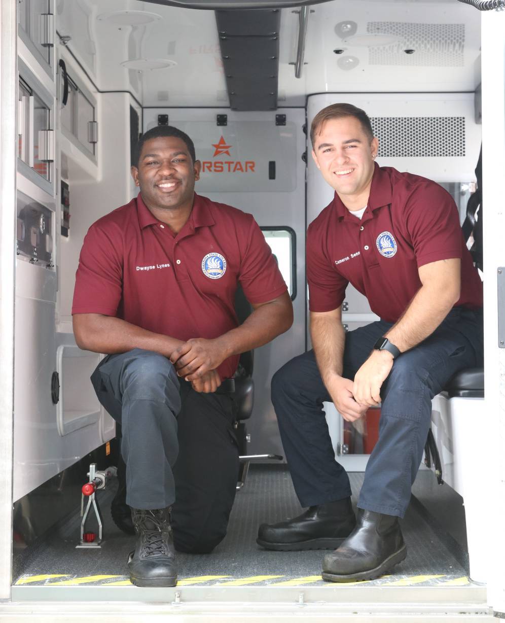 EMS students inside the training ambulance. 