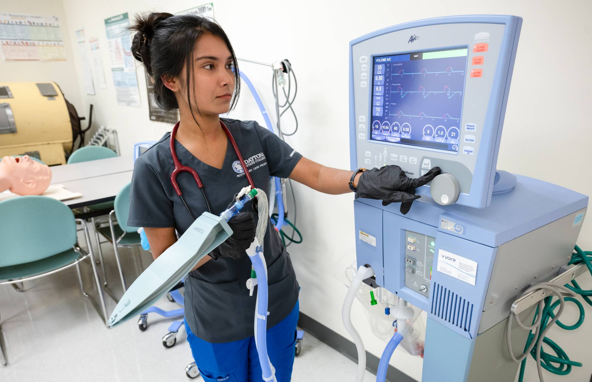 RT student with equipment in the lab