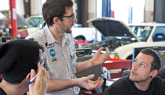 instructor and student in automotive program