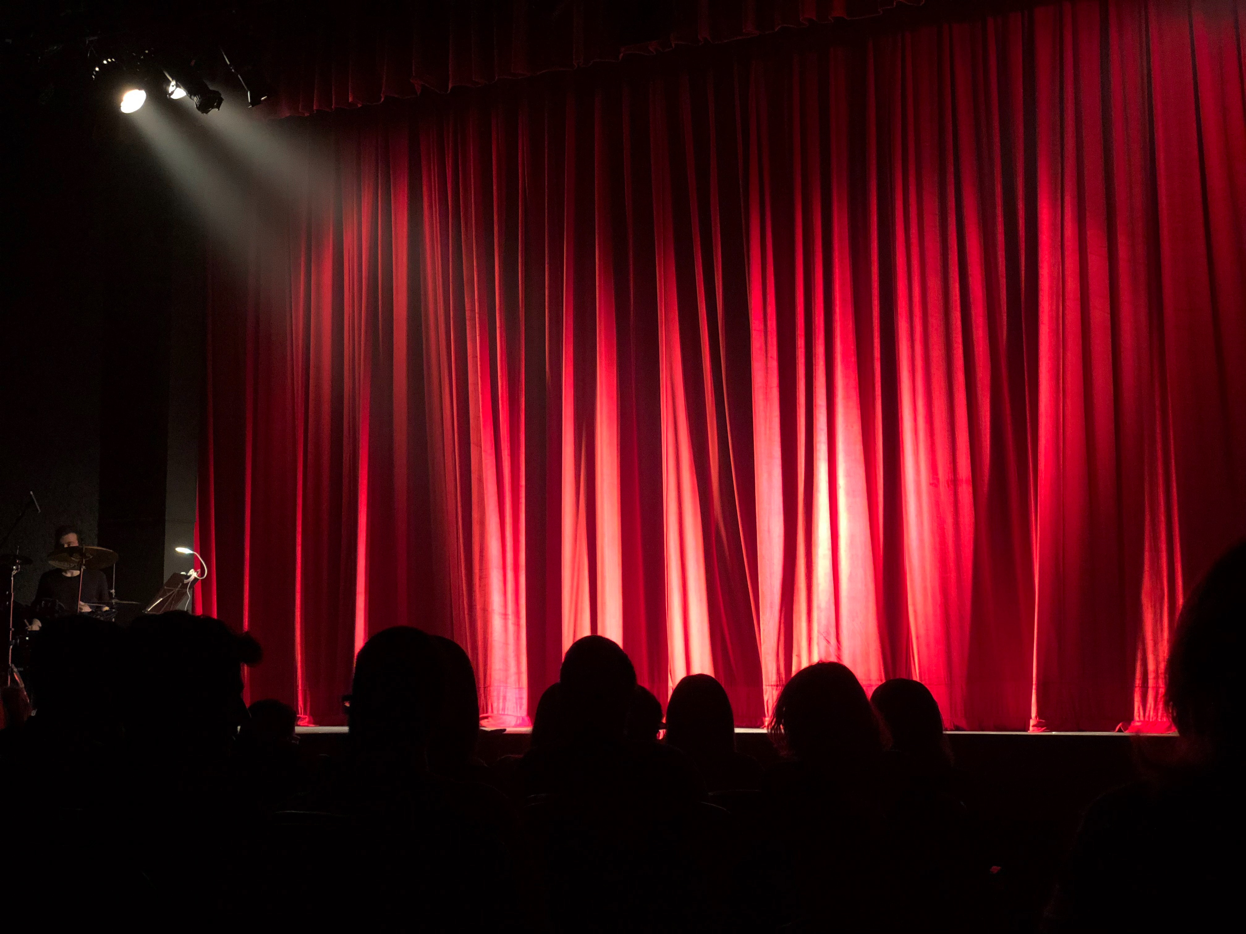 stage with lights and red curtain
