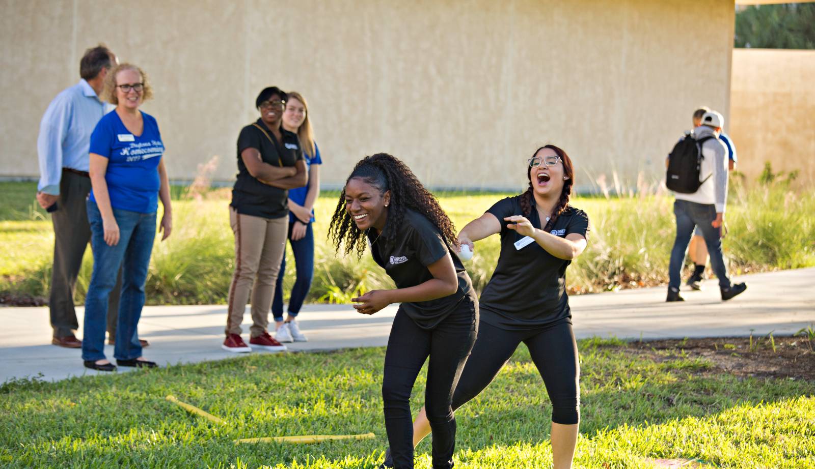 students playing outside at an event