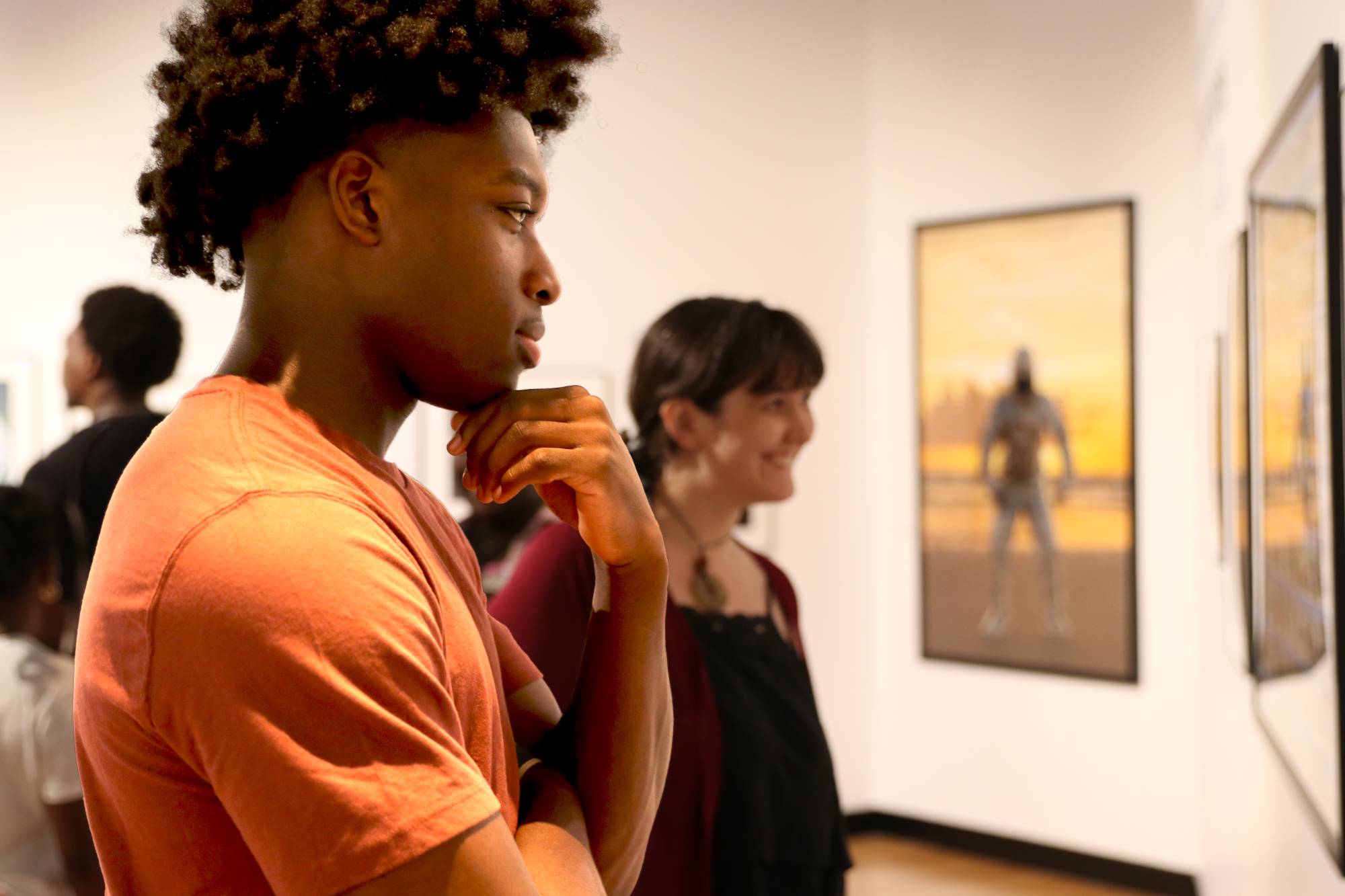 Students viewing photography in the Southeast Museum of Photography. 