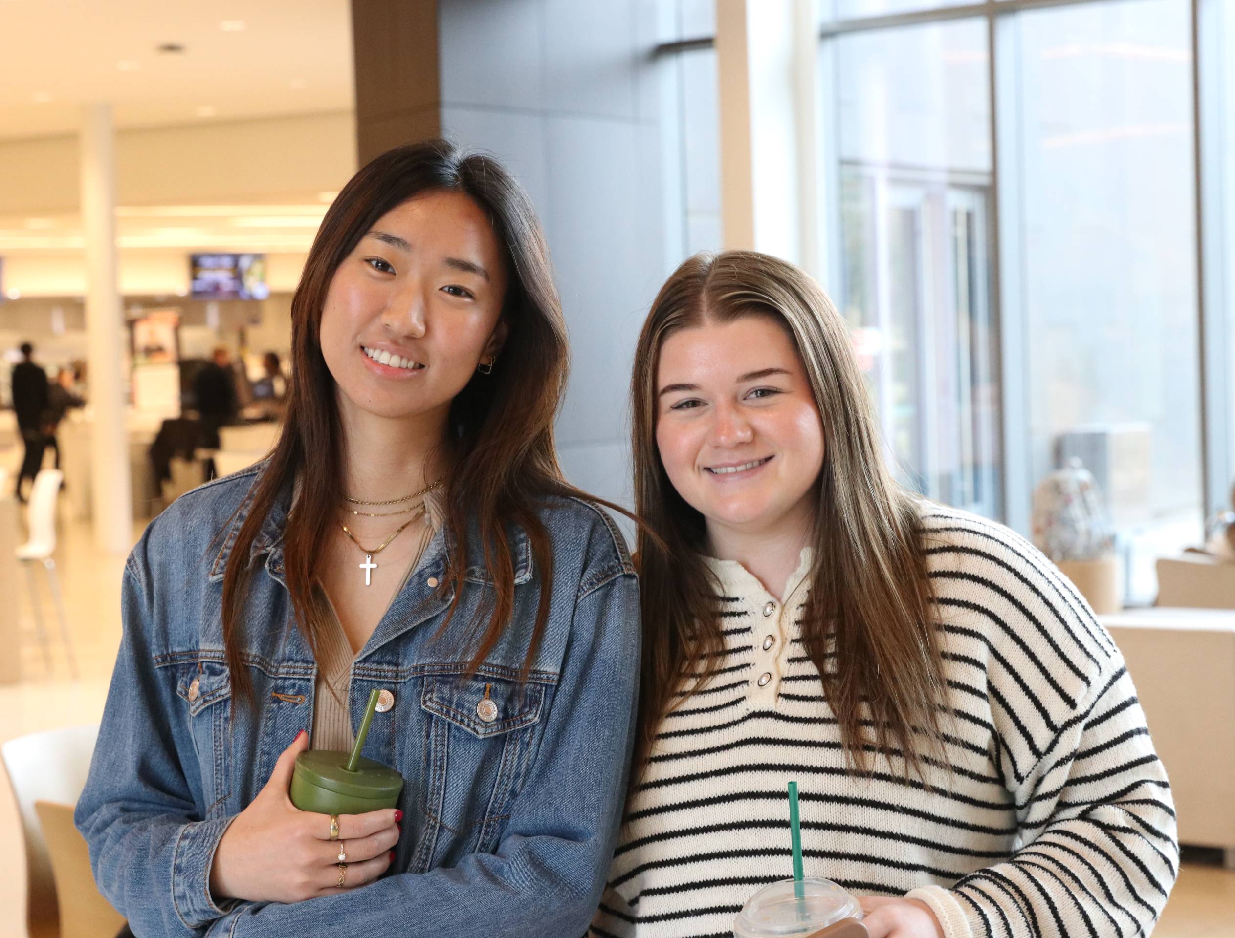 Two students enjoying the student center. 