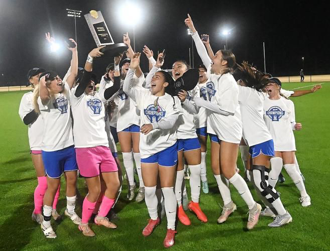 The Women's Soccer team celebrates their back to back national championship win. 