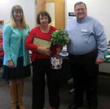 Ginger Tripp with Geraldine Rimstidt and Dr. James Greene at her retirement party. 
