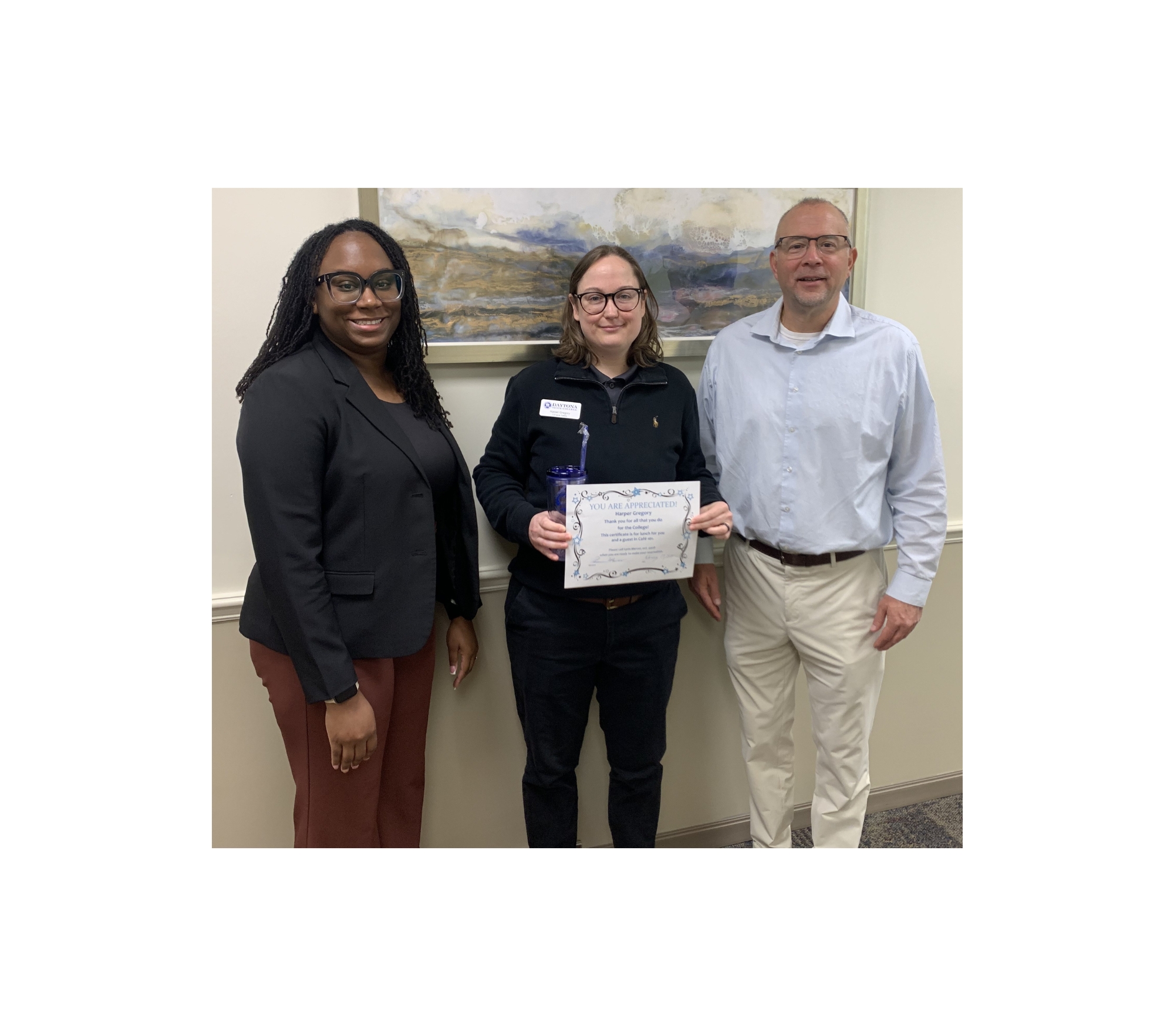 Outstanding employee Harper Gregory and administrators. 