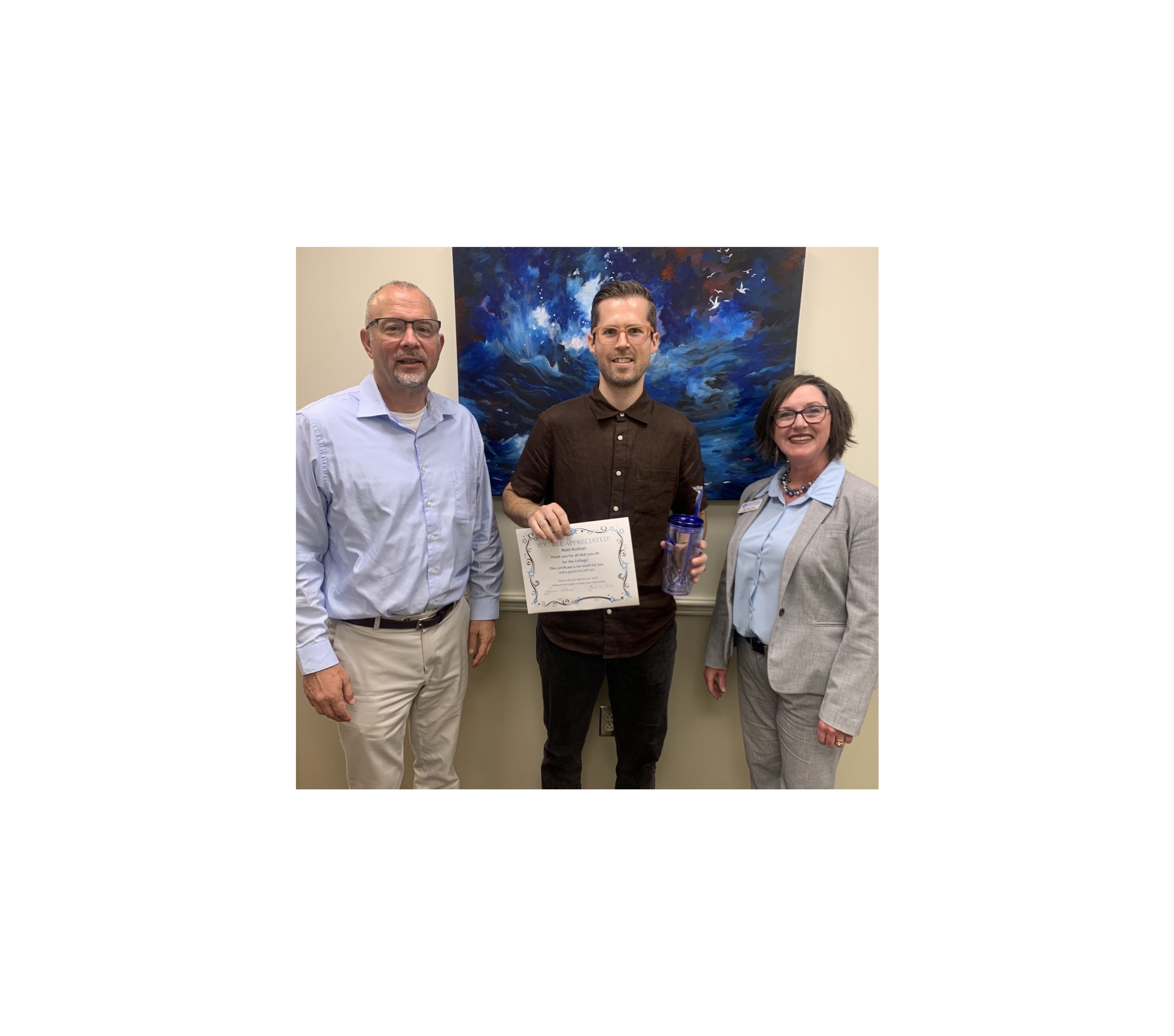 Outstanding employee Matt Kushan and administrators. 