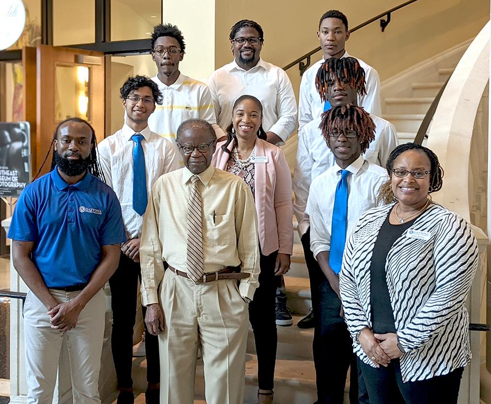 Members of the inaugural MOCI cohort stand with Daytona State faculty and staff members Enaris Inman (front left), Job Clement (front center), LaToya Shannon (front right) and Cerese Ramos (center) during their Rite of Passage at the Mori Hosseini Center on Wednesday.