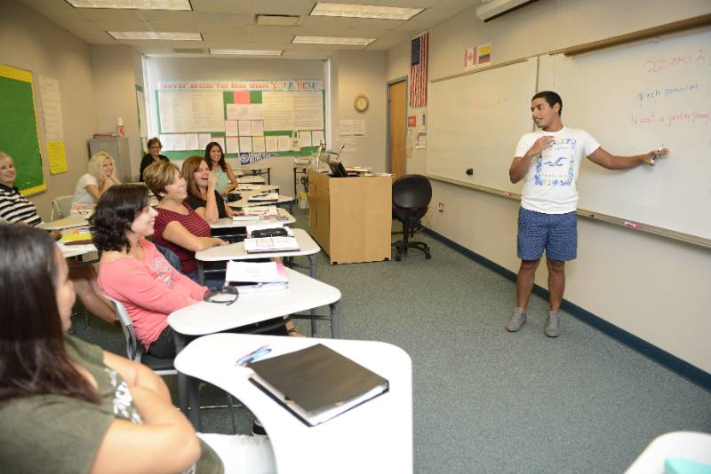 students presenting in front of a class